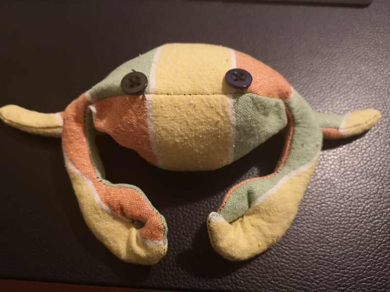 the crab bag, angled upward to show its seams